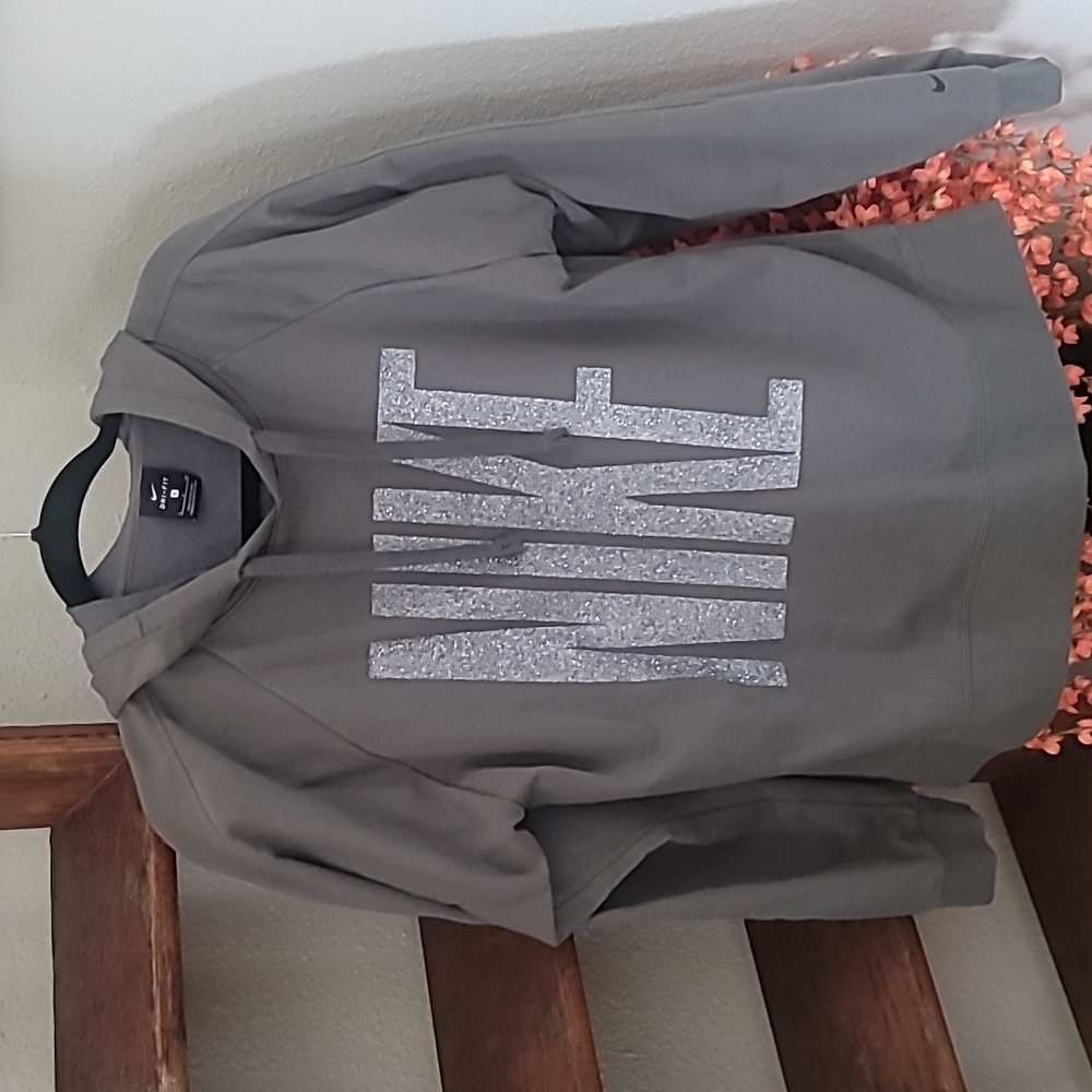 Nike grey hoodie with sparkle letters with slits.